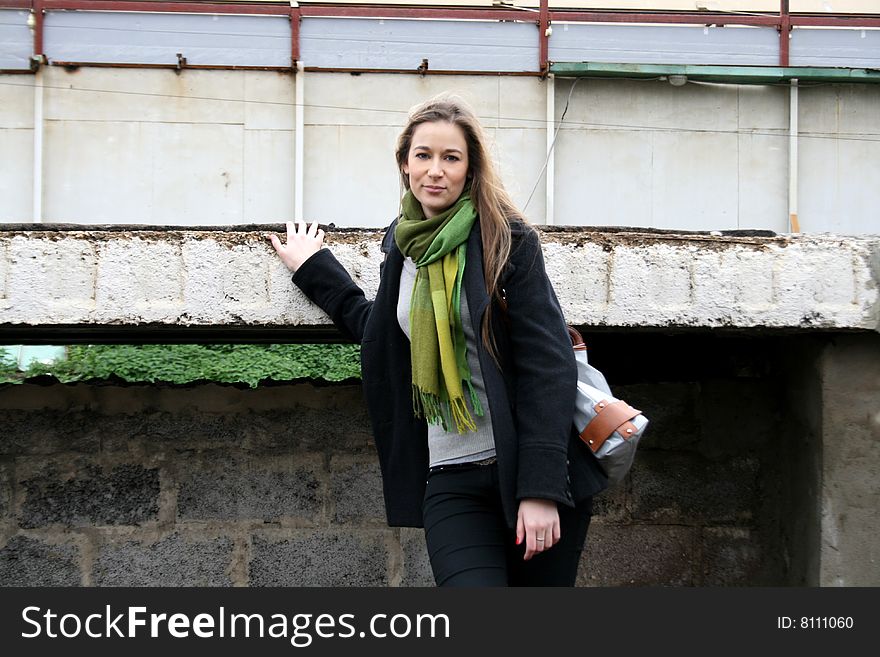 A girl standing near station. A girl standing near station