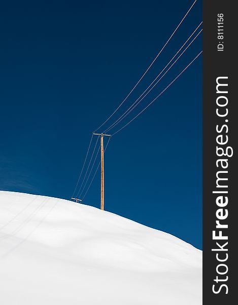 Power pole in front of clear sky. Power pole in front of clear sky