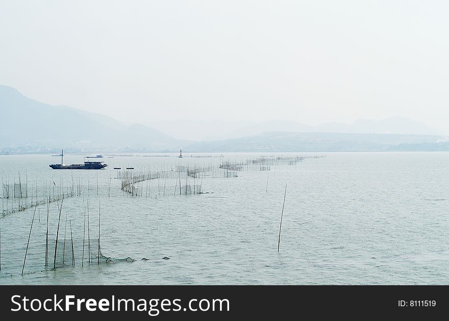 Scenery of chinese fishing nets and boats. Scenery of chinese fishing nets and boats