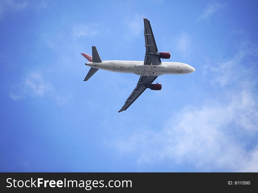 The airplane with blue sky.