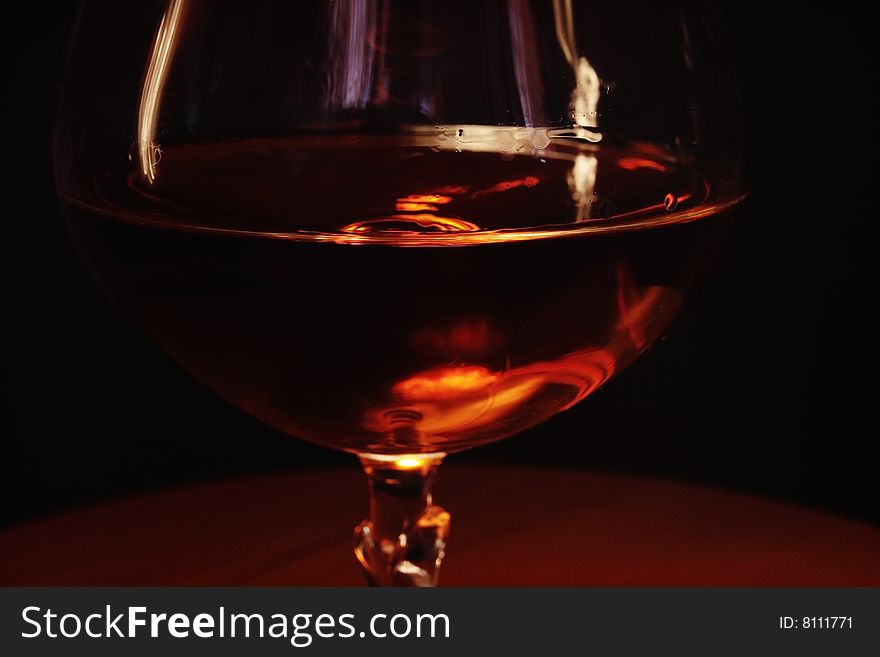 Brandy in glass ,focus on a foreground