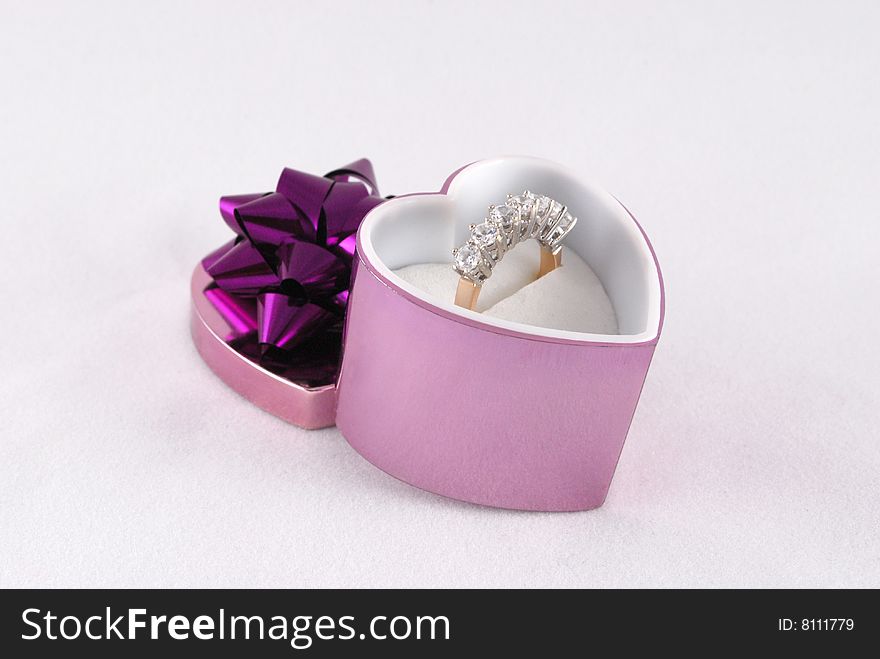 Jewelers ring in the purple casket. Jewelers ring in the purple casket