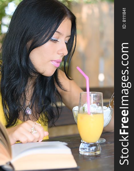 Lovely student girl in cafe