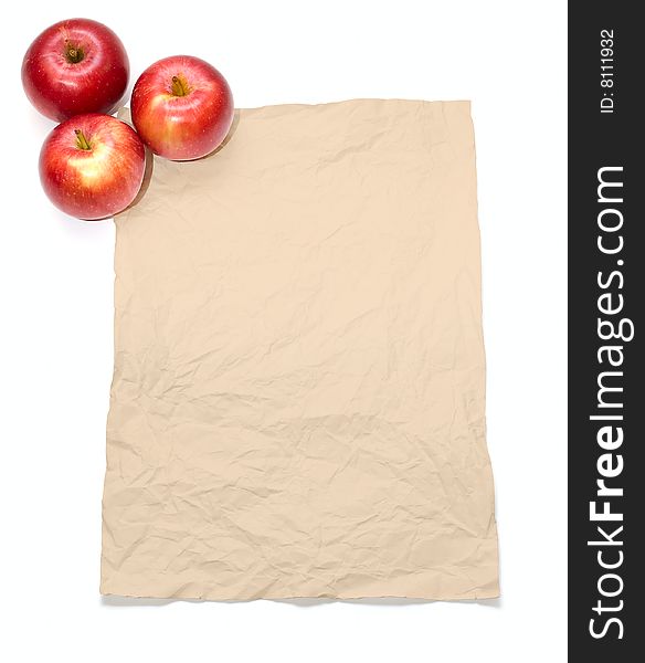 Grunge paper and three apples isolated on white