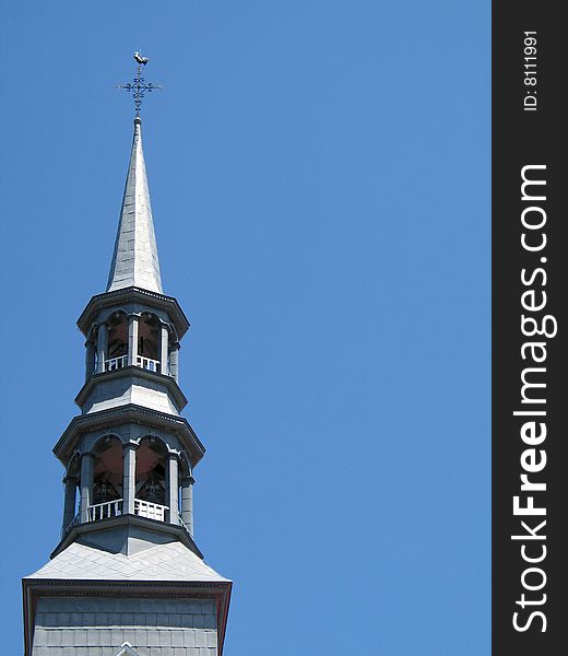 High church steeple and blue sky