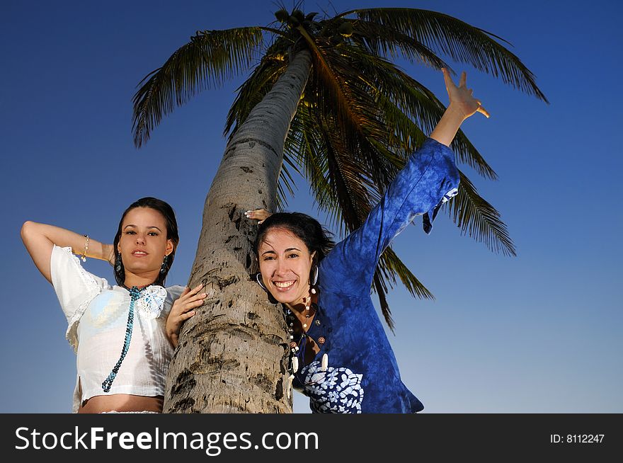 Portrait of two happy young women enjoying the summer breeze. Portrait of two happy young women enjoying the summer breeze