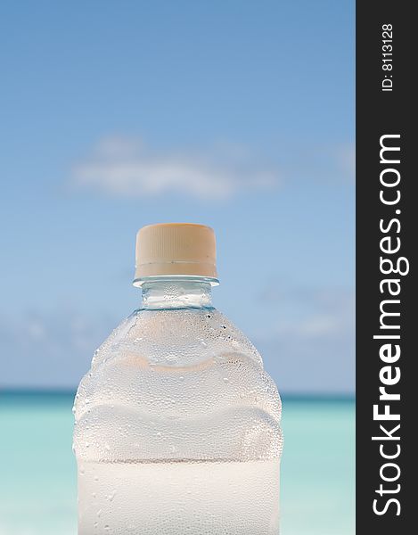 Cold bottle of water covered with drops. Cold bottle of water covered with drops