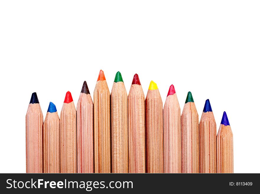 Natural wood colored pencils isolated over a white background