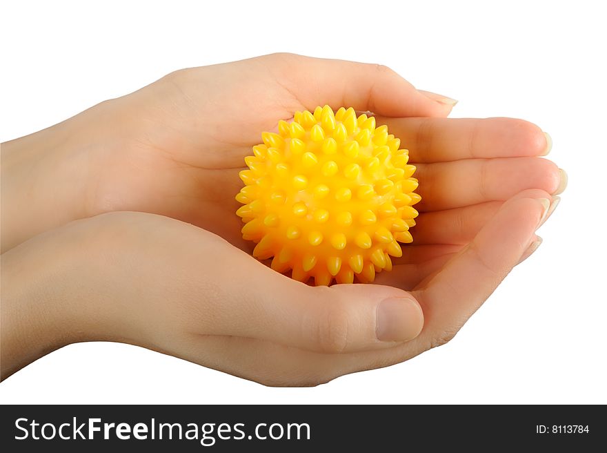 Prickly massage ball in hand isolated on white