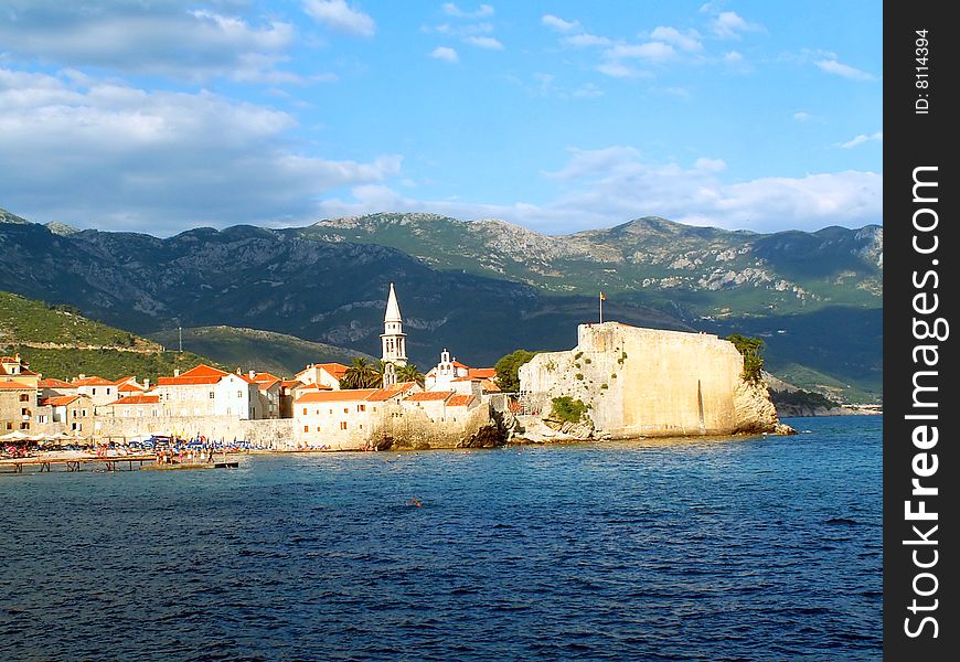An old town of Budva, situated on a peninsula and surrounded by city walls. An old town of Budva, situated on a peninsula and surrounded by city walls