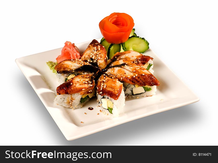 Sushi and salmon on a white plate