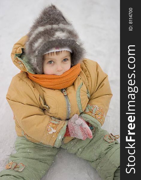 Little girl on winter background