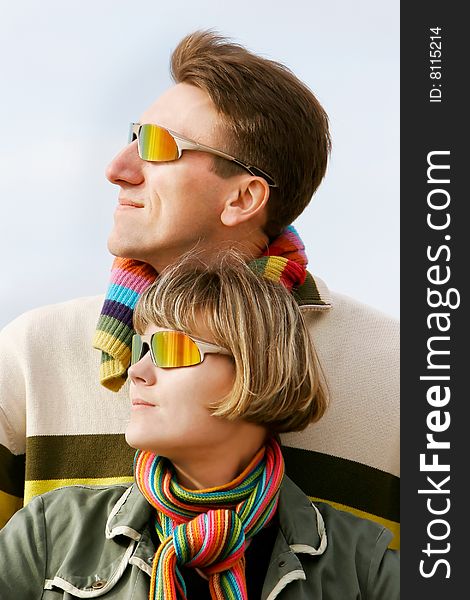 Portrait of young couple in sunglasses