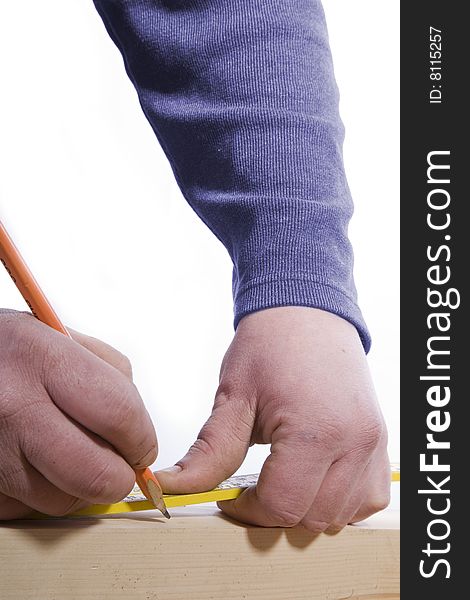 Marking wood with a pencil for construction