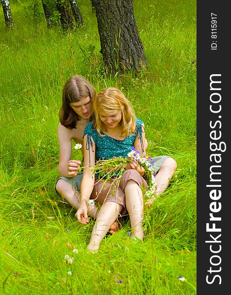 Loving couple on the meadow