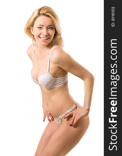 Blond woman wearing white lingerie on white background. Blond woman wearing white lingerie on white background