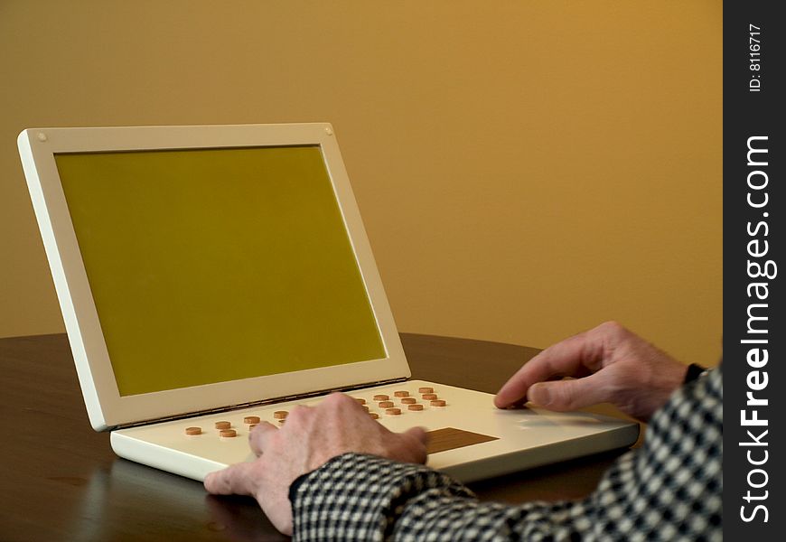 A man used a unbranded concept laptop. A man used a unbranded concept laptop.