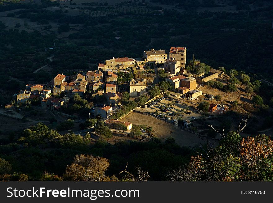 a corsican village in light. a corsican village in light