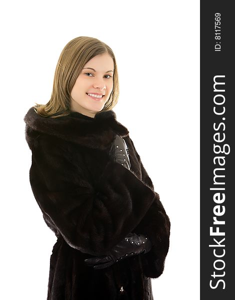 Beautiful smiling woman in mink fur coat; isolated