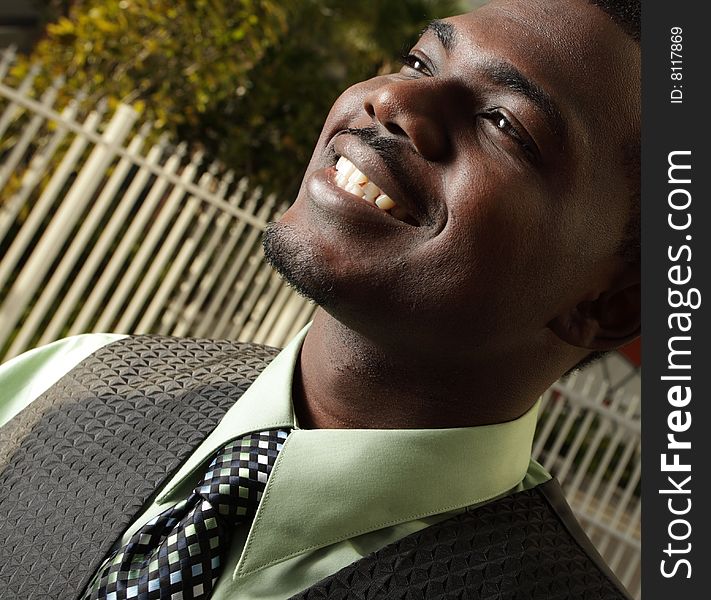 Handsome African American man smiling. Handsome African American man smiling