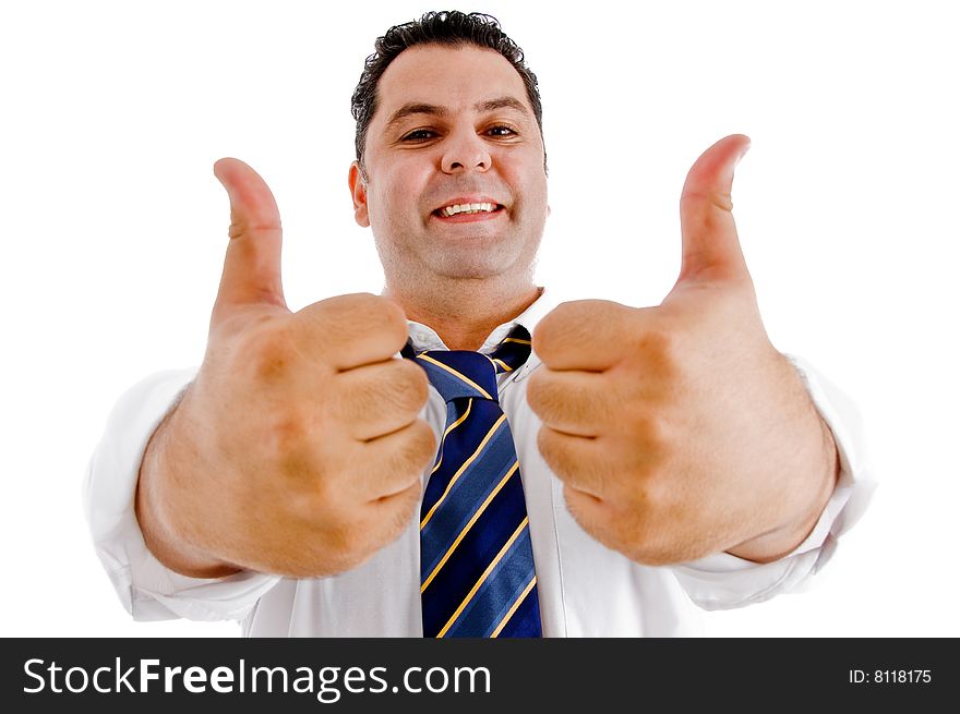 Smiling executive with goodluck hand gesture isolated with white background