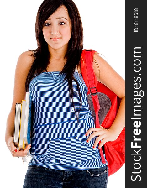 College girl posing with bag and books