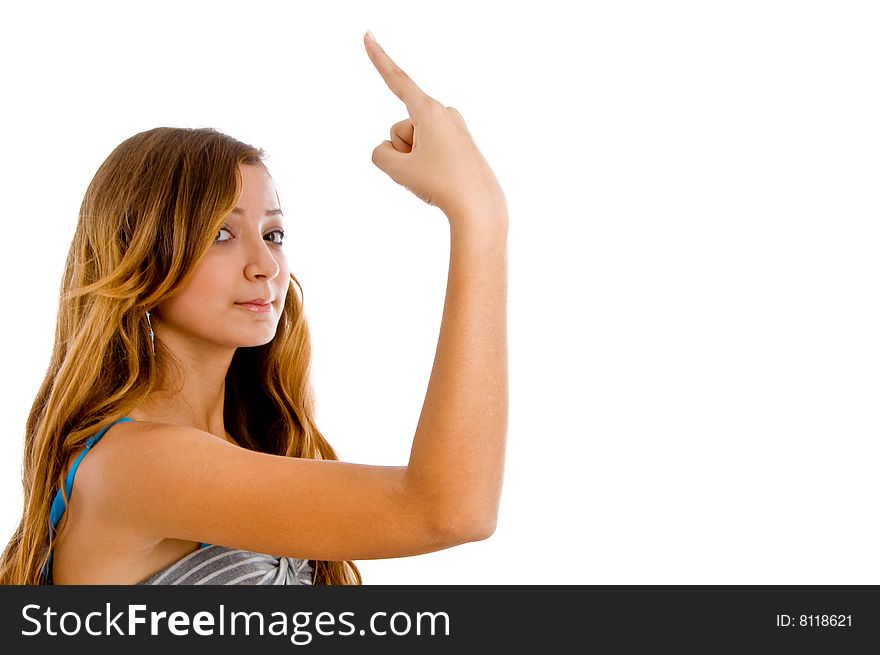 Young female indicating with her finger isolated with white background. Young female indicating with her finger isolated with white background