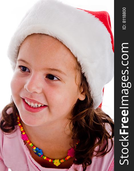 Portrait of child with christmas hat against an isolated background