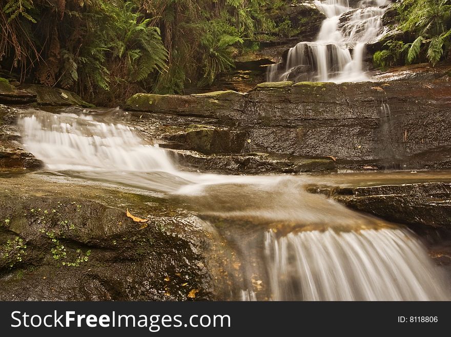 Misty waterfall in Blue mountains National park in NSW, Australia. Misty waterfall in Blue mountains National park in NSW, Australia.