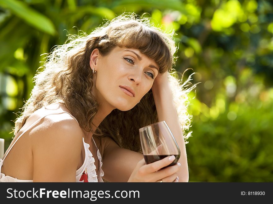 Portrait of young attractive woman having good time in tropic environment. Portrait of young attractive woman having good time in tropic environment