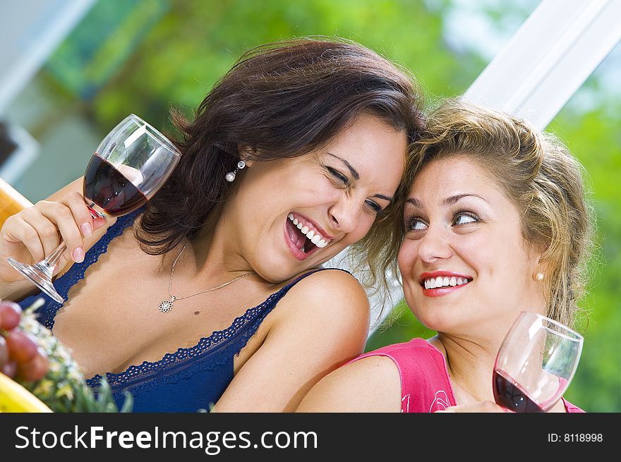 Portrait of two young attractive girls having good time. Portrait of two young attractive girls having good time
