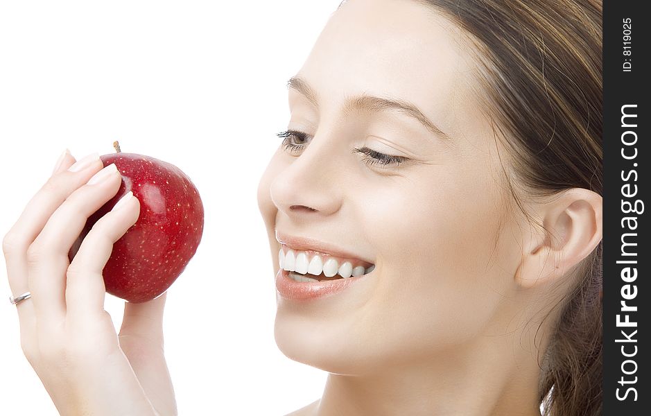 Portrait of young woman with red apple  on white back