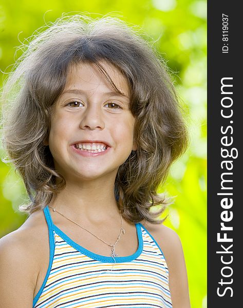 Portrait of little girl having good time in summer environment. Portrait of little girl having good time in summer environment