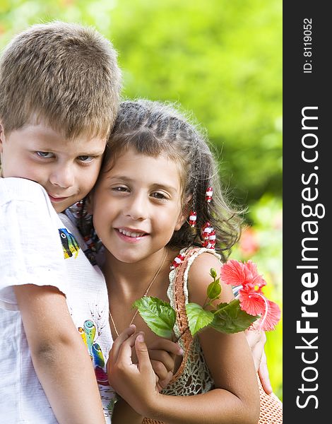 Portrait of little kids having good time in summer environment. Portrait of little kids having good time in summer environment