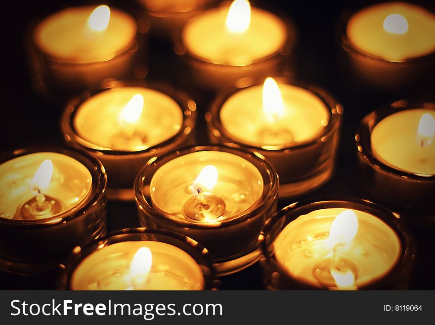 Romantic conflagrant candles in darkness. Romantic conflagrant candles in darkness
