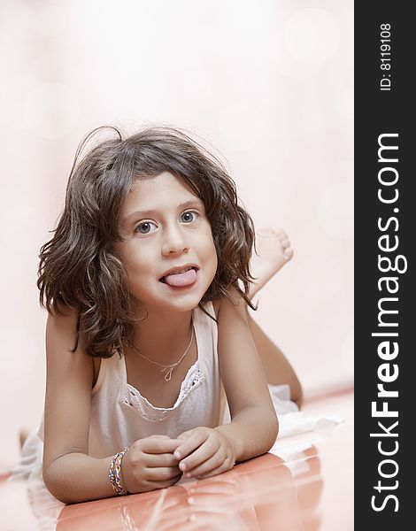 Studio portrait of  nice little girl having good time