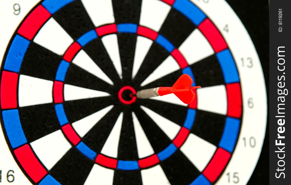 The dart on the bullseye. The dart on the bullseye