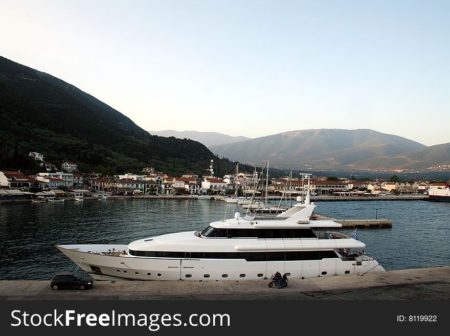 Big motor yacht in the harbor of Sami, Kefalonia, Greece