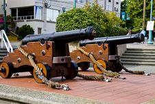 Two Old Cannons On Sidewalk Royalty Free Stock Images Two Old Cannons On Sidewalk Royalty Free Stock Images