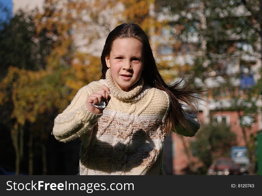 Quickly runing little girl, to go in for sports. Quickly runing little girl, to go in for sports