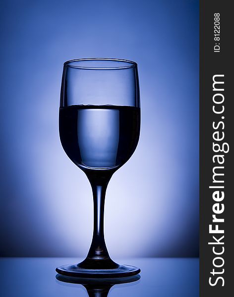 Image of glass on blue background. Image of glass on blue background