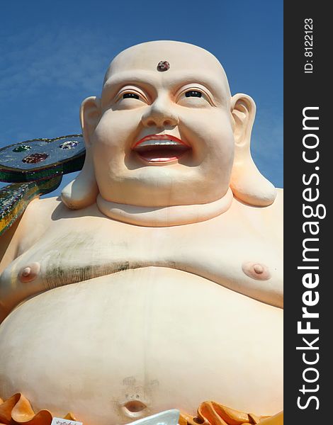 Statue of a Laughing Buddha, Hatyai, Thailand.