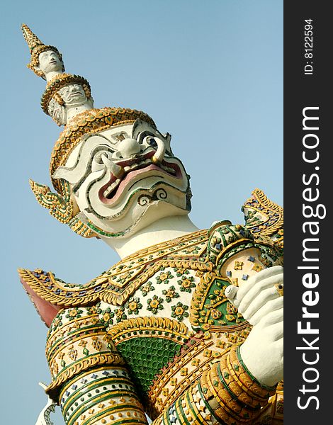 A temple guardian at Wat Arun, Bangkok, Thailand.