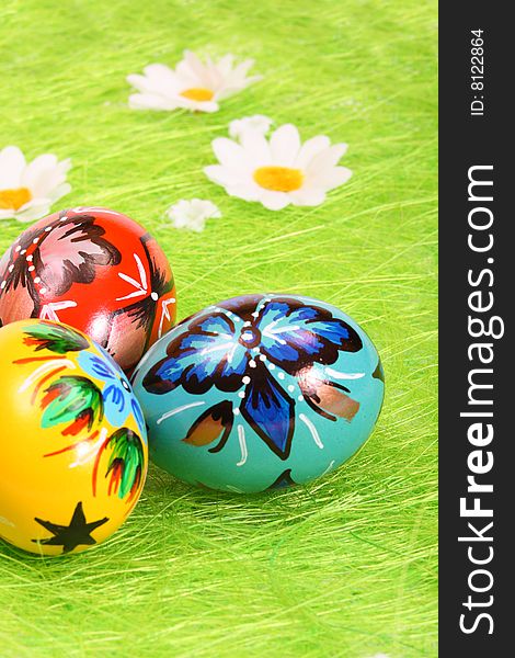 Painted Colorful Easter Eggs on green Grass