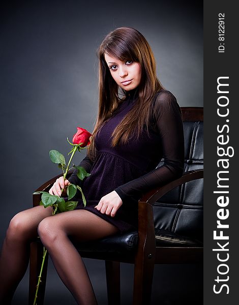 Attractive girl with rose