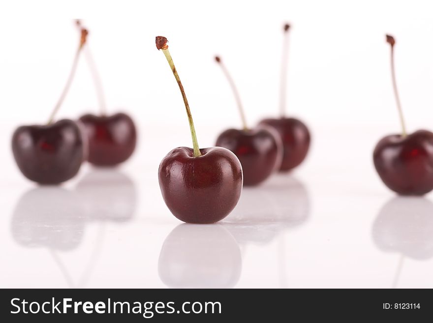 Red cherries objects isolated on white background