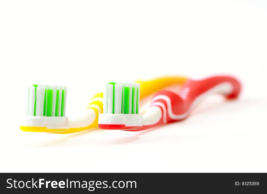 Two toothbrushes on white background