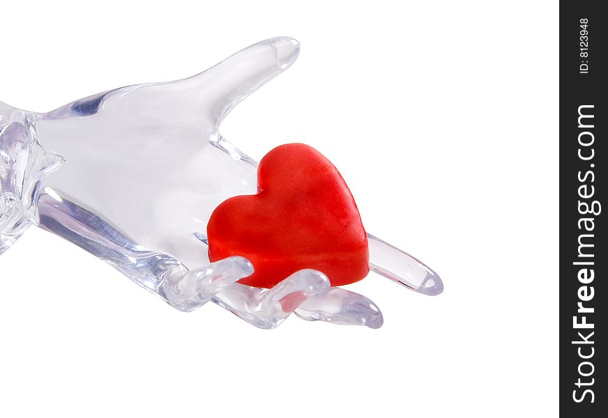 Glass or ice hand holding a heart (Fragility of Love concept)