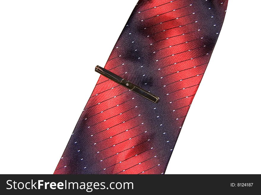 Closeup of a red and black tie with a tie-clip (isolated on white)