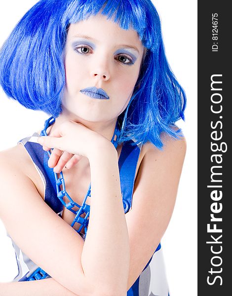 Young enthusiastic child with a blue wig shot on a white background. Young enthusiastic child with a blue wig shot on a white background